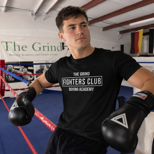 Model wearing The Grind Fighters Club T-shirt inside The Grind gym